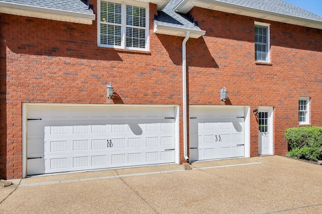 511 Derby Downs, Lebanon, TN 37087 - view of side of property with concrete driveway, an attached garage, and a shingled roof