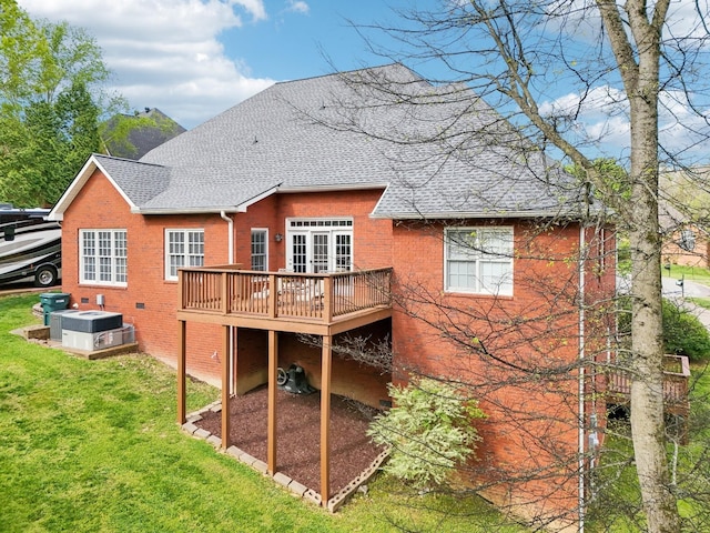 511 Derby Downs, Lebanon, TN 37087 - rear view of house featuring roof with shingles, a wooden deck, a yard, and brick siding