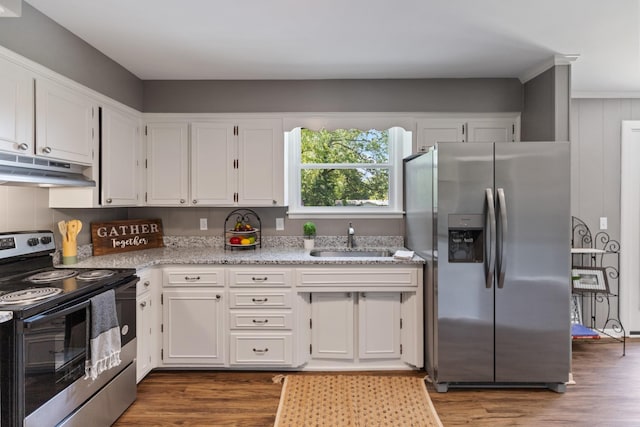 100 Eleazer Dr, Dickson, TN 37055 - kitchen with stainless steel appliances, under cabinet range hood, white cabinets, and dark wood-style flooring