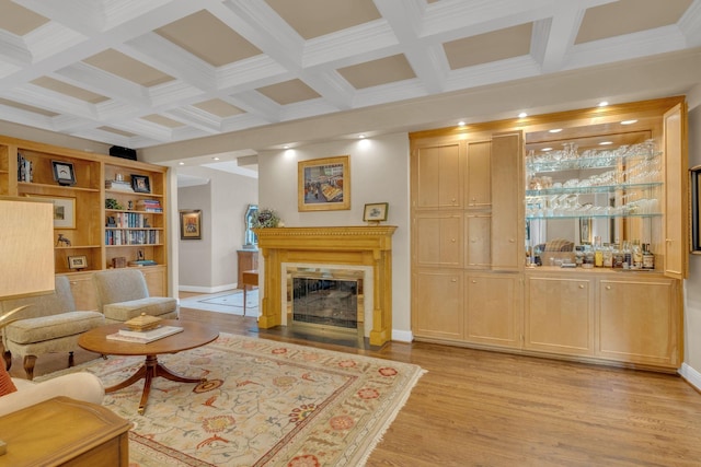 111 Hardingwoods Pl, Nashville, TN 37205 - living room featuring light wood-style floors, ornamental molding, coffered ceiling, a fireplace, and bar area