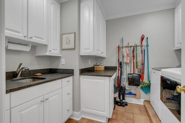 111 Hardingwoods Pl, Nashville, TN 37205 - kitchen featuring separate washer and dryer, white cabinetry, and ornamental molding
