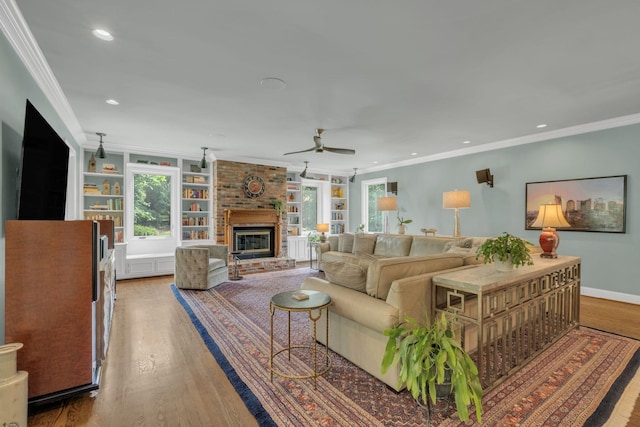 111 Hardingwoods Pl, Nashville, TN 37205 - living area featuring wood finished floors, recessed lighting, crown molding, ceiling fan, and a fireplace