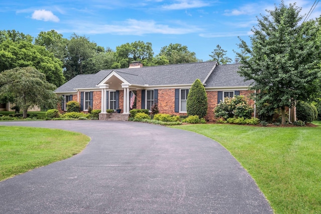 111 Hardingwoods Pl, Nashville, TN 37205 - ranch-style house featuring brick siding, a front lawn, driveway, and a chimney