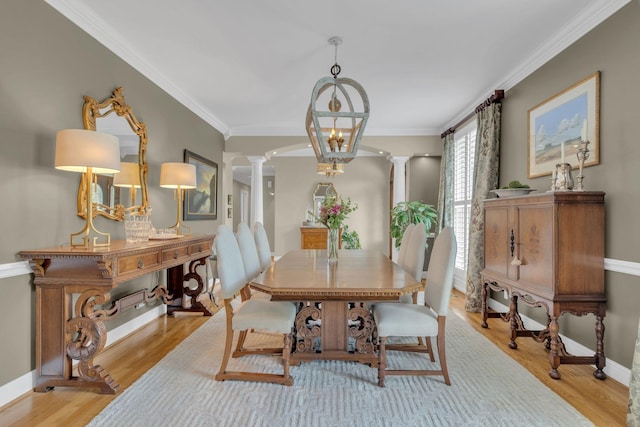 111 Hardingwoods Pl, Nashville, TN 37205 - dining area with ornate columns, ornamental molding, and light wood finished floors