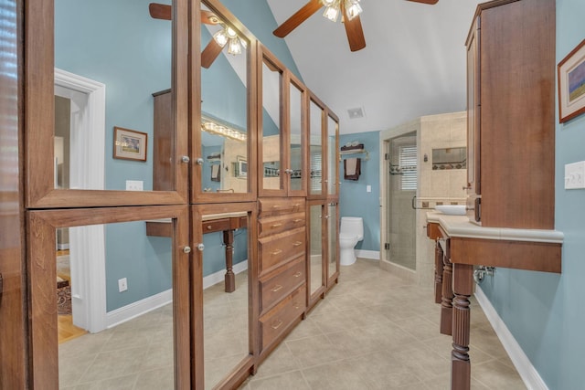 111 Hardingwoods Pl, Nashville, TN 37205 - bathroom featuring ceiling fan, lofted ceiling, tile patterned flooring, and a stall shower