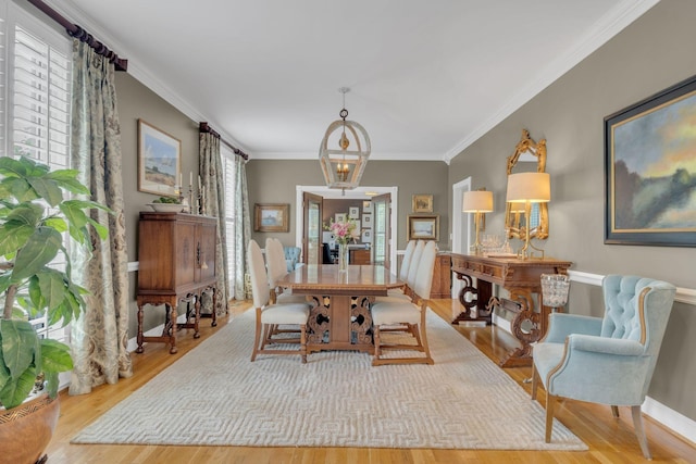 111 Hardingwoods Pl, Nashville, TN 37205 - dining room with wood finished floors, ornamental molding, and a chandelier