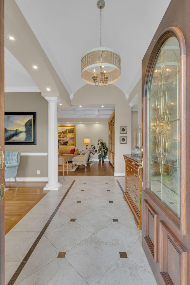 111 Hardingwoods Pl, Nashville, TN 37205 - entrance foyer featuring inlaid floor details, decorative columns, ornamental molding, recessed lighting, and a chandelier