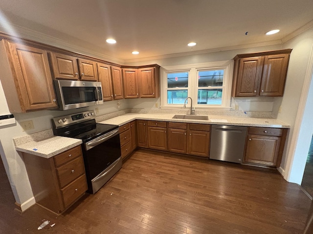 8827 Horton Hwy, College Grove, TN 37046 - kitchen with appliances with stainless steel finishes, ornamental molding, dark wood-type flooring, recessed lighting, and brown cabinets