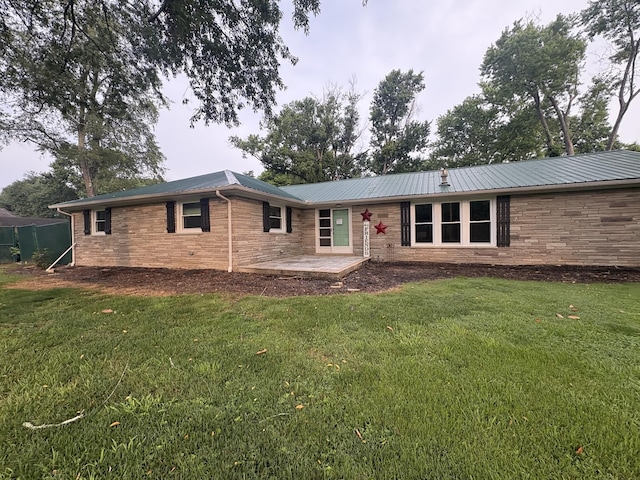 8827 Horton Hwy, College Grove, TN 37046 - ranch-style home with a front yard, a metal roof, and stone siding