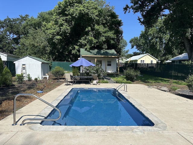 8827 Horton Hwy, College Grove, TN 37046 - view of pool featuring an outbuilding, a fenced backyard, and a patio