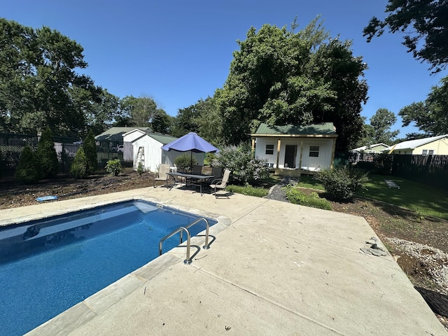 8827 Horton Hwy, College Grove, TN 37046 - view of swimming pool featuring an outbuilding and a patio area