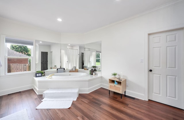 723 Alecia Page Cv, Humboldt, TN 38343 - bathroom with ornamental molding, wood finished floors, a garden tub, and recessed lighting