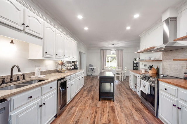 723 Alecia Page Cv, Humboldt, TN 38343 - kitchen featuring stainless steel electric range, beverage cooler, wall chimney exhaust hood, white cabinets, and light wood-style flooring