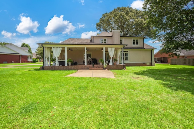 723 Alecia Page Cv, Humboldt, TN 38343 - rear view of house with a ceiling fan, a patio, crawl space, stucco siding, and a chimney