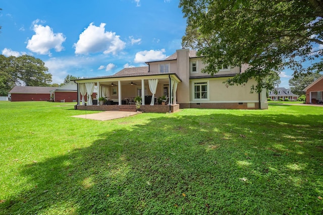 723 Alecia Page Cv, Humboldt, TN 38343 - back of house featuring crawl space, a ceiling fan, a patio, and a lawn