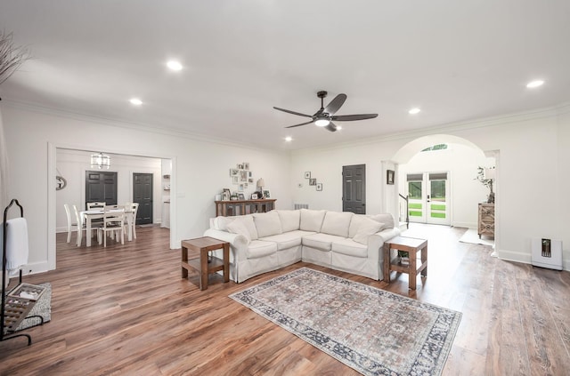723 Alecia Page Cv, Humboldt, TN 38343 - living area with arched walkways, crown molding, ceiling fan, recessed lighting, and wood finished floors