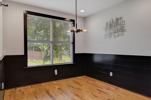2136 Buena Vista Pike Unit B, Nashville, TN 37218 - unfurnished dining area with wainscoting, light wood-style flooring, and recessed lighting