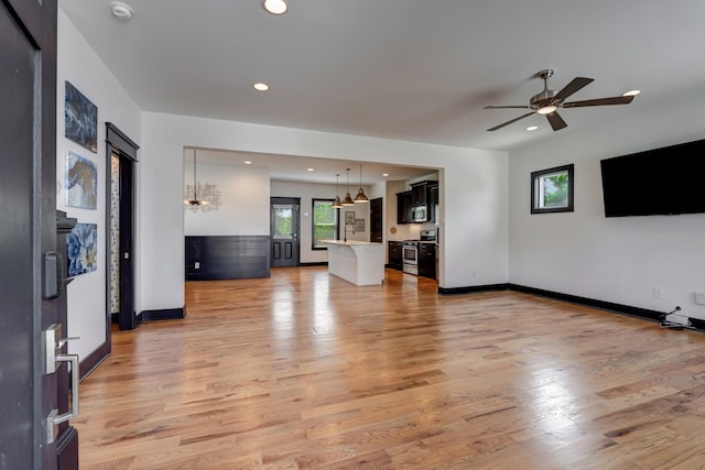 2136 Buena Vista Pike Unit B, Nashville, TN 37218 - unfurnished living room featuring light wood finished floors, a ceiling fan, and recessed lighting