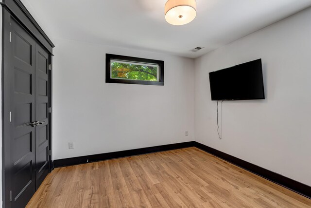 2136 Buena Vista Pike Unit B, Nashville, TN 37218 - empty room featuring light wood finished floors and baseboards