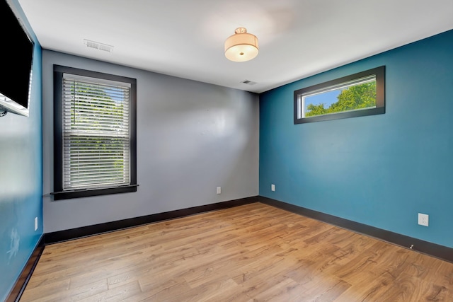 2136 Buena Vista Pike Unit B, Nashville, TN 37218 - spare room with wood finished floors and healthy amount of natural light