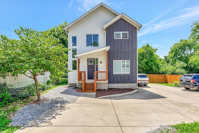 2136 Buena Vista Pike Unit B, Nashville, TN 37218 - view of front of home with board and batten siding and concrete driveway