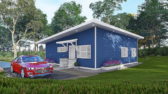 7721 Harper Rd, Hixson, TN 37343 - view of home's exterior with a lawn