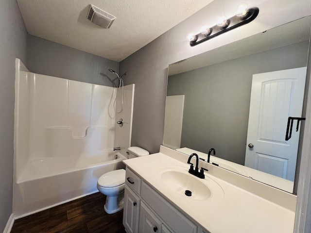 4977 Little Dry Creek Rd, Pulaski, TN 38478 - full bath with wood finished floors, vanity, shower / tub combination, and a textured ceiling
