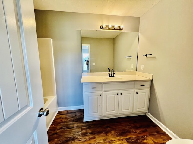 4977 Little Dry Creek Rd, Pulaski, TN 38478 - full bath with wood finished floors, vanity, and  shower combination