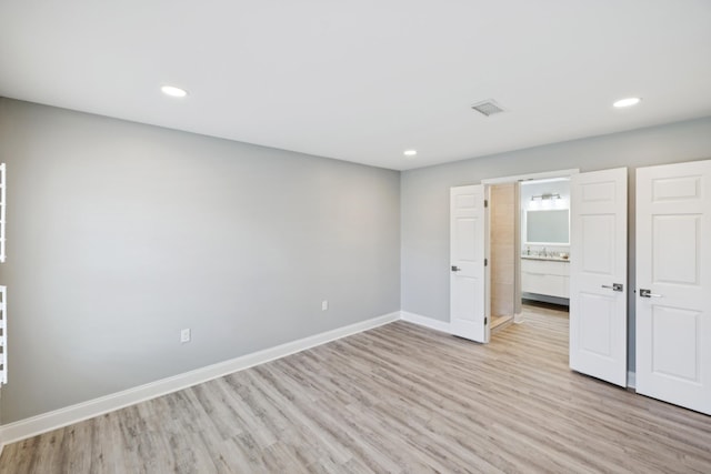 438 Siena Dr, Nashville, TN 37205 - unfurnished bedroom with light wood-style floors and recessed lighting