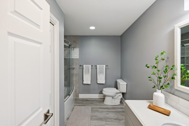 438 Siena Dr, Nashville, TN 37205 - full bathroom with vanity, enclosed tub / shower combo, wood finished floors, and recessed lighting