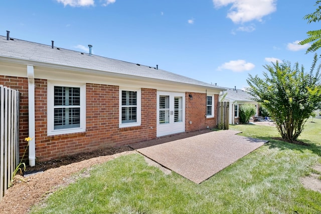 438 Siena Dr, Nashville, TN 37205 - back of property with a patio area, brick siding, and a lawn