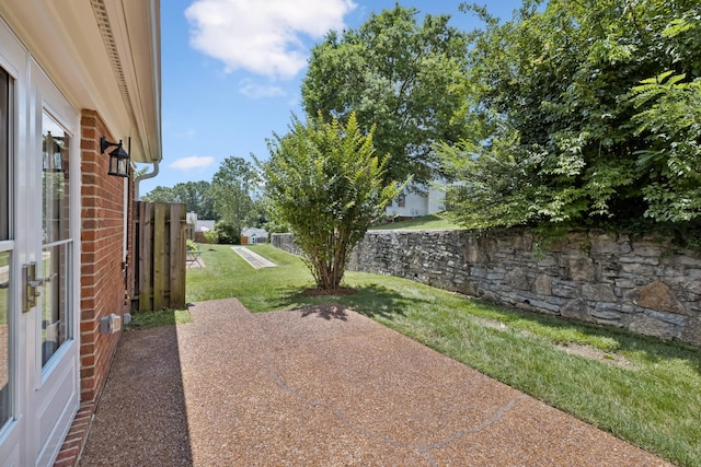 438 Siena Dr, Nashville, TN 37205 - view of grassy yard featuring a patio