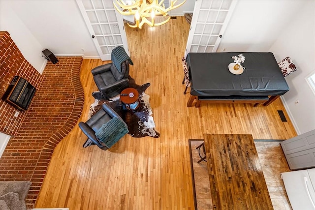 802 Evans Rd, Winchester, TN 37398 - living area with wood finished floors and a chandelier
