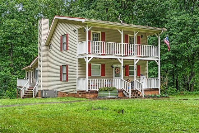 802 Evans Rd, Winchester, TN 37398 - view of front of house with a balcony, covered porch, crawl space, a chimney, and a front yard