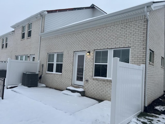 204 Douglas Bend Rd Unit 804, Gallatin, TN 37066 - snow covered rear of property featuring entry steps and brick siding