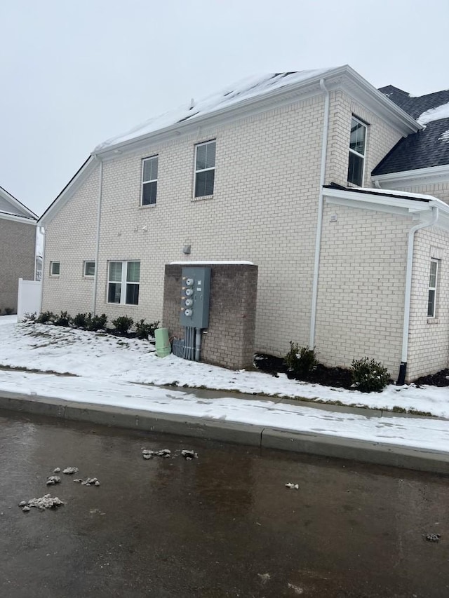 204 Douglas Bend Rd Unit 804, Gallatin, TN 37066 - snow covered rear of property with brick siding