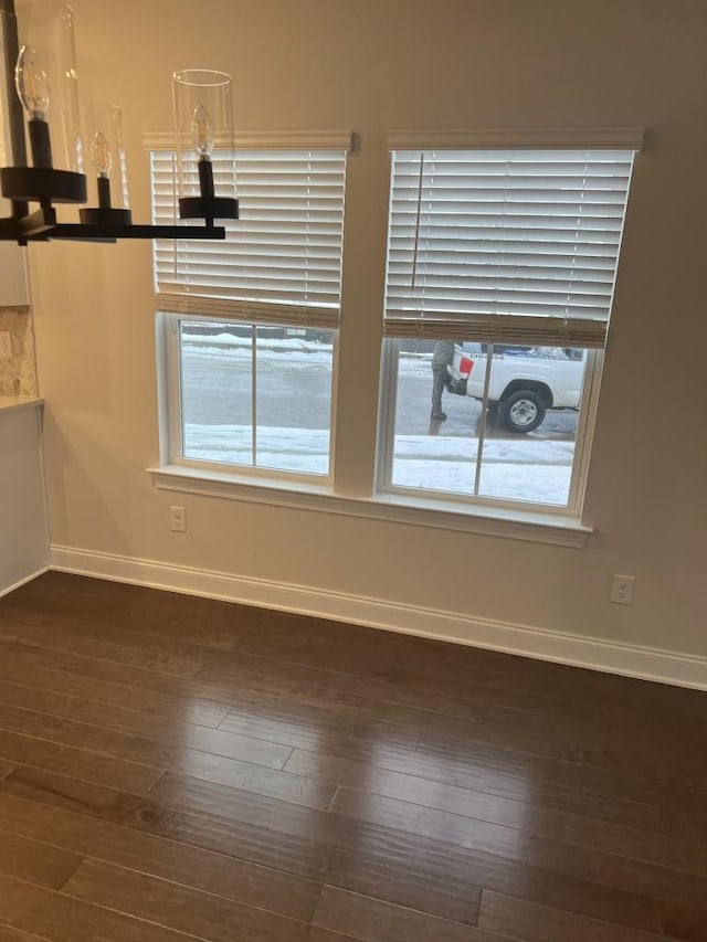 204 Douglas Bend Rd Unit 804, Gallatin, TN 37066 - unfurnished room featuring dark wood-type flooring and a chandelier