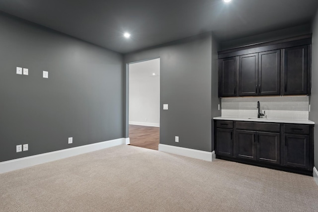 7262 Murrel Dr, Franklin, TN 37064 - bar area featuring light carpet, decorative backsplash, and recessed lighting