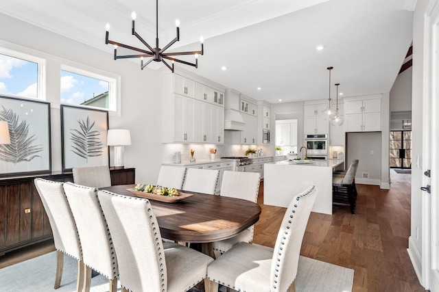7262 Murrel Dr, Franklin, TN 37064 - dining space with a chandelier, dark wood finished floors, recessed lighting, and crown molding