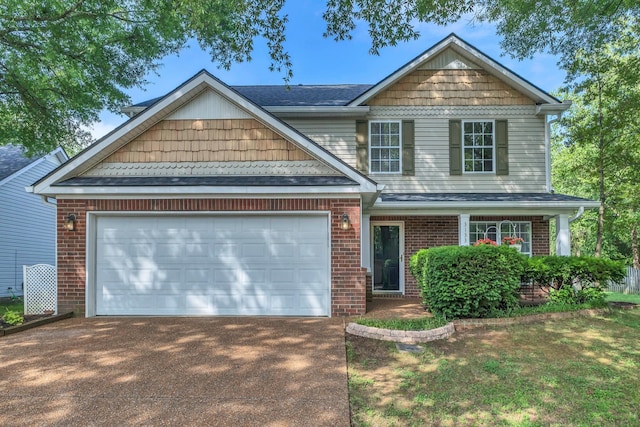 3133 Winberry Dr, Franklin, TN 37064 - view of front of house with concrete driveway, brick siding, and an attached garage