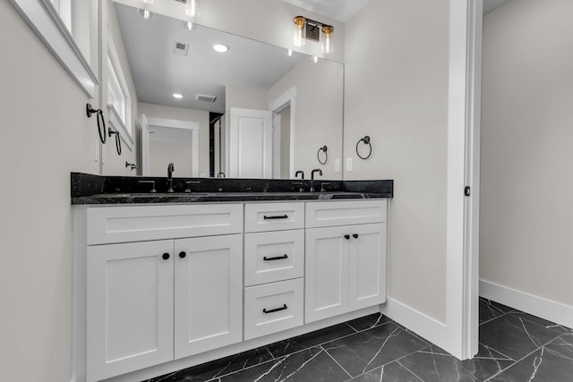 333 Isbill Rd, Chattanooga, TN 37419 - full bath featuring marble look tile flooring, double vanity, and recessed lighting