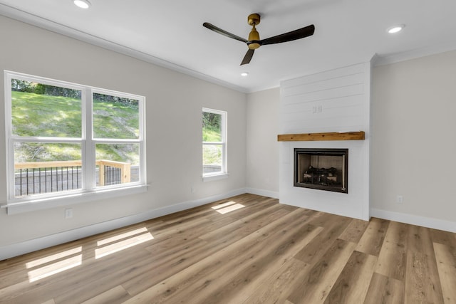 333 Isbill Rd, Chattanooga, TN 37419 - unfurnished living room with ornamental molding, a large fireplace, wood finished floors, ceiling fan, and recessed lighting