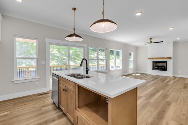 333 Isbill Rd, Chattanooga, TN 37419 - kitchen with stainless steel dishwasher, light wood finished floors, light countertops, hanging light fixtures, and crown molding