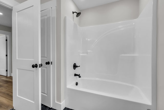 333 Isbill Rd, Chattanooga, TN 37419 - bathroom featuring washtub / shower combination and wood finished floors