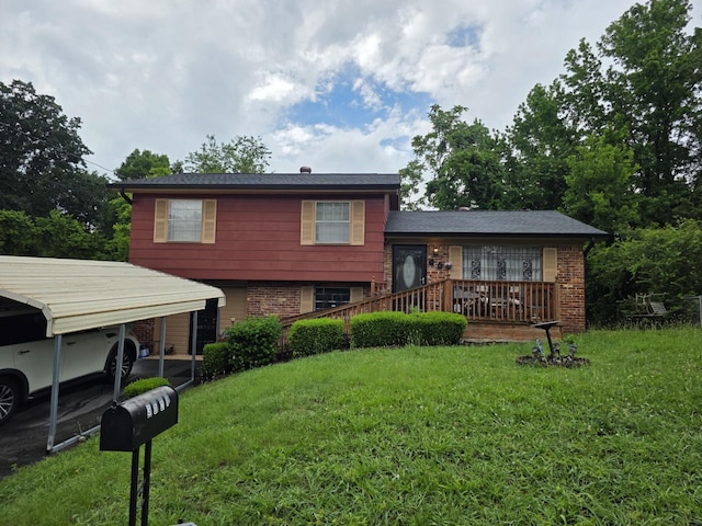 3021 Towerway Dr, Chattanooga, TN 37406 - tri-level home featuring brick siding and a front yard