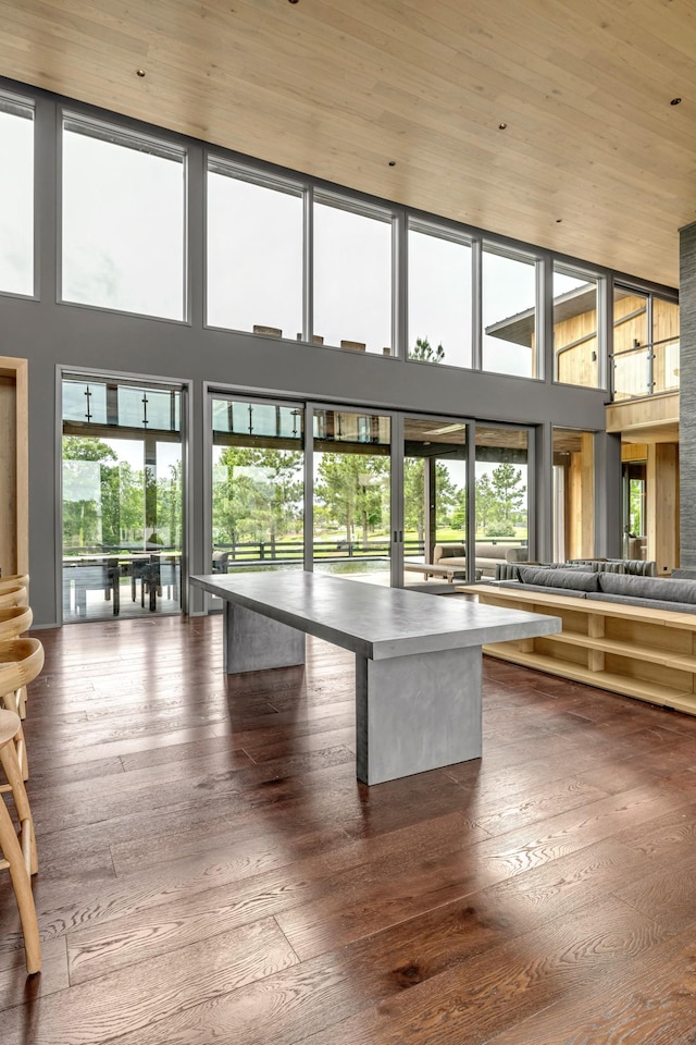 8005 Backwoods Dr, College Grove, TN 37046 - game room with a high ceiling, plenty of natural light, and dark wood-type flooring
