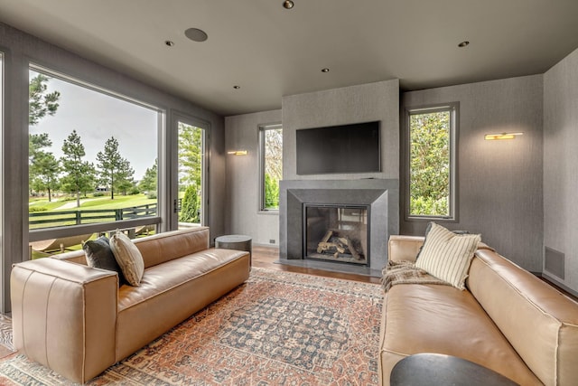 8005 Backwoods Dr, College Grove, TN 37046 - living room with a glass covered fireplace and healthy amount of natural light