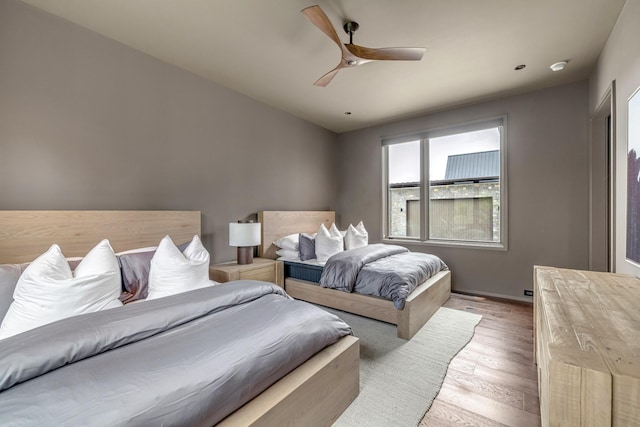 8005 Backwoods Dr, College Grove, TN 37046 - bedroom featuring light wood-style floors and ceiling fan