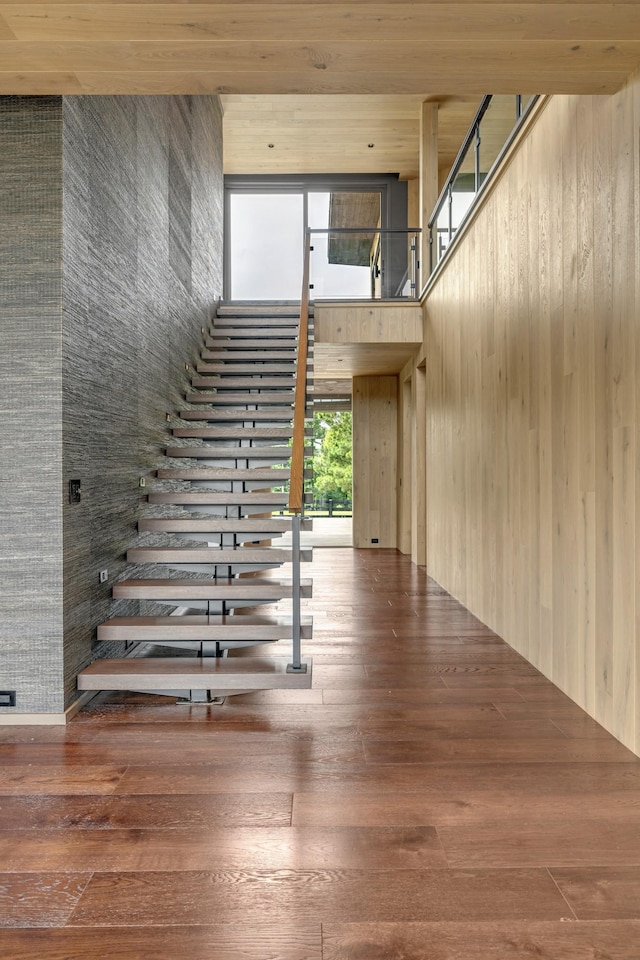 8005 Backwoods Dr, College Grove, TN 37046 - stairway with a towering ceiling and hardwood / wood-style floors