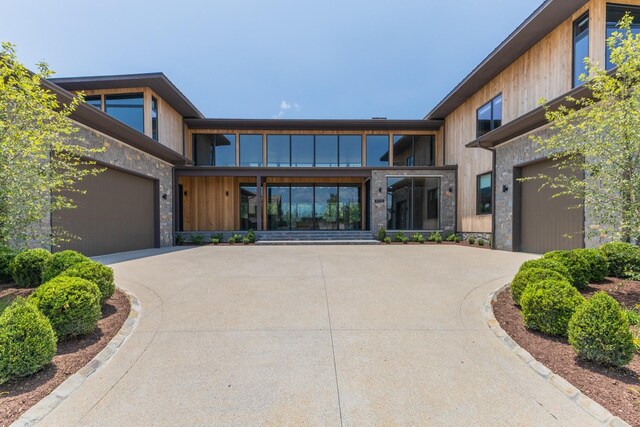 8005 Backwoods Dr, College Grove, TN 37046 - view of front of property featuring stone siding and concrete driveway